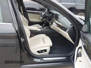 2018 BMW 5 Series 530e with VIN WBAJA9C55JB033575, listed as a IAAI auction lot 42067380 with 111,902 mi miles and . Bid and sale history available at DreamBid. Image 5.
