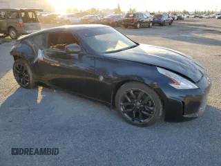 2015 Nissan 370Z with VIN JN1AZ4EH8FM444456, listed as a Copart auction lot 67407134 with 58,513 mi miles and Salvage Title. Bid and sale history available at carsss.com. Image 4.