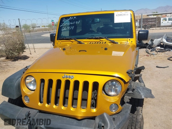 2014 Jeep Wrangler Sport with VIN 1C4AJWAG5EL223883, listed as a IAAI auction lot 42002814 with 134,361 mi miles and . Bid and sale history available at carsss.com. Image 12.