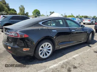 2018 Tesla Model S 75D с VIN 5YJSA1E24JF248762, выставлен на аукционе Copart как лот 61501075 с пробегом 63 802 миль миль и Списание • Salvage title. История ставок и продаж доступна на DreamBid. Изображение 3.