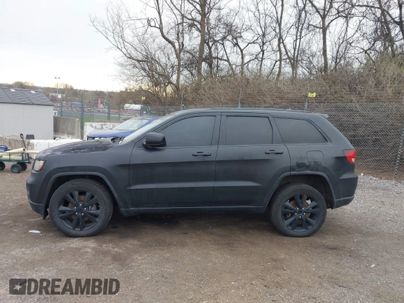 2013 Jeep Grand Cherokee Laredo with VIN 1C4RJEAG2DC573970, listed as a IAAI auction lot 41892914 with 185,050 mi miles. Bid and sale history available at carsss.com. Image 14.