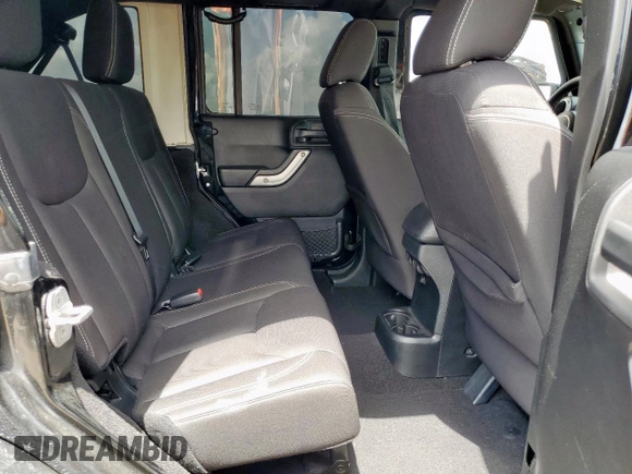 2015 Jeep Wrangler Unlimited Sahara with VIN 1C4BJWEG4FL668339, listed as a Copart auction lot 61221325 with 117,887 mi miles and Salvage title. Bid and sale history available at DreamBid. Image 10.