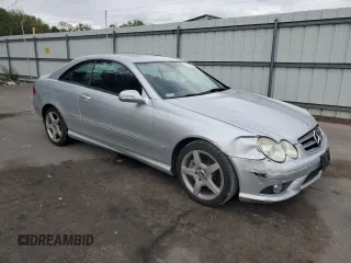 2007 Mercedes-Benz CLK 550 with VIN WDBTJ72H97F214917, listed as a Copart auction lot 73154374 with 110,017 mi miles and Salvage Title. Bid and sale history available at DreamBid. Image 4.