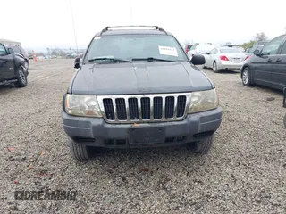 2003 Jeep Grand Cherokee Laredo with VIN 1J4GX48SX3C604904, listed as a IAAI auction lot 40884443 with 188,352 mi miles. Bid and sale history available at carsss.com. Image 12.