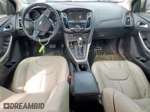 2018 Ford Focus Titanium z VIN 1FADP3J26JL279443, wystawiony jako Copart lot #58837435 z przebiegiem 136 538 mil mil oraz Szkoda całkowita • Salvage title. Historia ofert i sprzedaży dostępna na DreamBid. Obrazek 8.