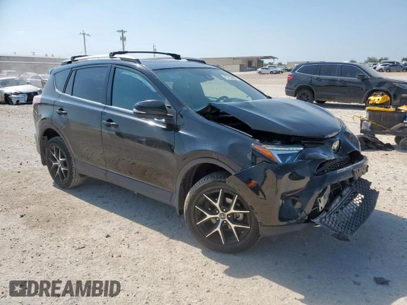 2018 Toyota RAV4 SE with VIN 2T3NFREV6JW436488, listed as a Copart auction lot 60297905 with 74,034 mi miles and Salvage title. Bid and sale history available at DreamBid. Image 4.