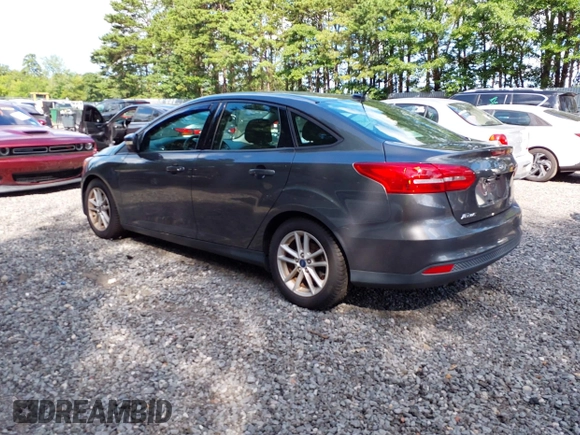 2018 Ford Focus SE z VIN 1FADP3FE0JL284107, wystawiony jako IAAI lot #42815845 z przebiegiem 110 155 mil mil oraz . Historia ofert i sprzedaży dostępna na DreamBid. Obrazek 3.