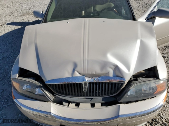 2000 Lincoln LS with VIN 1LNHM86S3YY877685, listed as a Copart auction lot 77091934 with 99,560 mi miles and Salvage Title. Bid and sale history available at carsss.com. Image 12.
