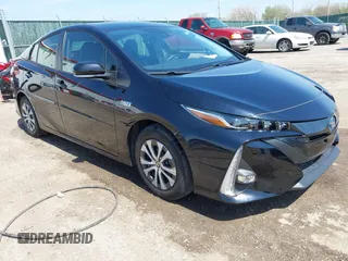 2021 Toyota Prius LE z VIN JTDKAMFP5M3187029, wystawiony jako IAAI lot #41985248 z przebiegiem 16 419 mil mil oraz . Historia ofert i sprzedaży dostępna na DreamBid. Obrazek 1.