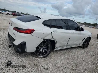 2024 BMW X4 M40i with VIN 5UX43DT02R9X54021, listed as a Copart auction lot 80482964 with 7,657 mi miles and Salvage Title. Bid and sale history available at carsss.com. Image 3.