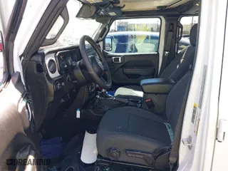 2024 Jeep Wrangler Willys with VIN 1C4PJXDN7RW104649, listed as a IAAI auction lot 41855892 with 16,762 mi miles. Bid and sale history available at carsss.com. Image 5.
