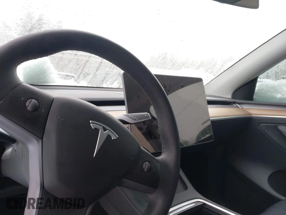 2023 Tesla Model Y Performance with VIN 7SAYGDEF4PF797192, listed as a IAAI auction lot 41550259 with 13,312 mi miles and . Bid and sale history available at DreamBid. Image 17.