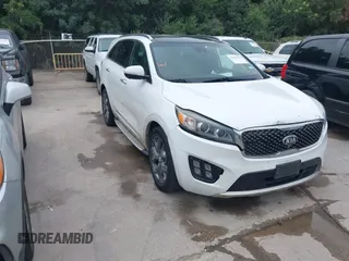 2016 Kia Sorento SXL z VIN 5XYPK4A10GG011768, wystawiony jako IAAI lot #42661289 z przebiegiem 155 121 mil mil oraz . Historia ofert i sprzedaży dostępna na DreamBid. Obrazek 1.