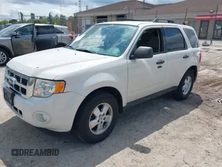 2012 Ford Escape XLT z VIN 1FMCU9DG2CKB18584, wystawiony jako IAAI lot #42469881 z przebiegiem 166 469 mil mil oraz . Historia ofert i sprzedaży dostępna na DreamBid. Obrazek 17.