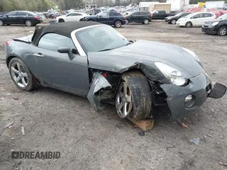 2009 Pontiac Solstice GXP z VIN 1G2MF35XX9Y100097, wystawiony jako IAAI lot #41921648 z przebiegiem 29 000 mil mil oraz . Historia ofert i sprzedaży dostępna na DreamBid. Obrazek 1.