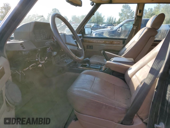 1992 Land Rover Range Rover with VIN SALHV1249NA616204, listed as a Copart auction lot 44428375 with 174,019 mi miles and Salvage Title. Bid and sale history available at DreamBid. Image 7.