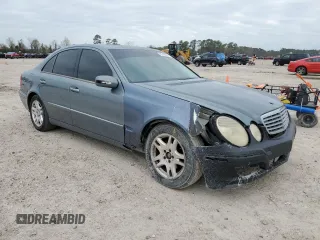 2005 Mercedes-Benz E-Class 3.2L with VIN WDBUF65J25A655040, listed as a Copart auction lot 87414674 with 147,847 mi miles and Salvage Title. Bid and sale history available at carsss.com. Image 4.