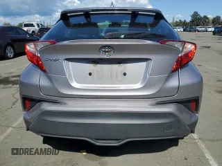 2018 Toyota C-HR XLE with VIN NMTKHMBX6JR047937, listed as a Copart auction lot 51705805 with 128,543 mi miles and Salvage Title. Bid and sale history available at DreamBid. Image 6.