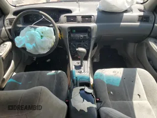1998 Toyota Camry LE с VIN JT2BG22K8W0122346, выставлен на аукционе Copart как лот 56286295 с пробегом Не указан миль и Списание • Salvage title. История ставок и продаж доступна на DreamBid. Изображение 8.