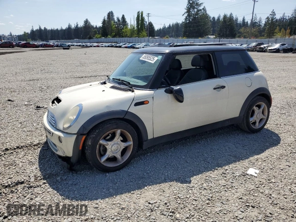 2006 MINI Hardtop with VIN WMWRC33586TJ77908, listed as a Copart auction lot 55095525 with 143,810 mi miles and Salvage title. Bid and sale history available at DreamBid. Image 1.