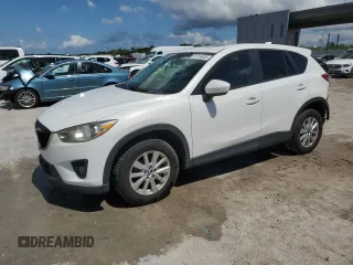2014 Mazda CX-5 Touring z VIN JM3KE4CY8E0334259, wystawiony jako Copart lot #57019435 z przebiegiem 200 775 mil mil oraz Tytuł czysty. Historia ofert i sprzedaży dostępna na DreamBid. Obrazek 1.