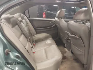 2002 Nissan Maxima GLE z VIN JN1DA31A12T308581, wystawiony jako IAAI lot #41742949 z przebiegiem 116 892 mil mil oraz . Historia ofert i sprzedaży dostępna na DreamBid. Obrazek 8.