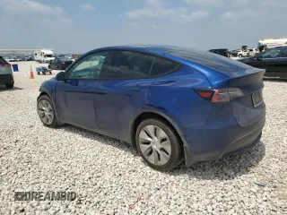 2022 Tesla Model Y Long Range z VIN 7SAYGDEE7NF313228, wystawiony jako Copart lot #55060705 z przebiegiem 32 238 mil mil oraz Szkoda całkowita • Salvage title. Historia ofert i sprzedaży dostępna na DreamBid. Obrazek 2.