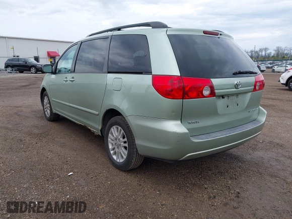 2007 Toyota Sienna CE with VIN 5TDZK23C87S017462, listed as a IAAI auction lot 42113773 with 201,306 mi miles. Bid and sale history available at carsss.com. Image 3.