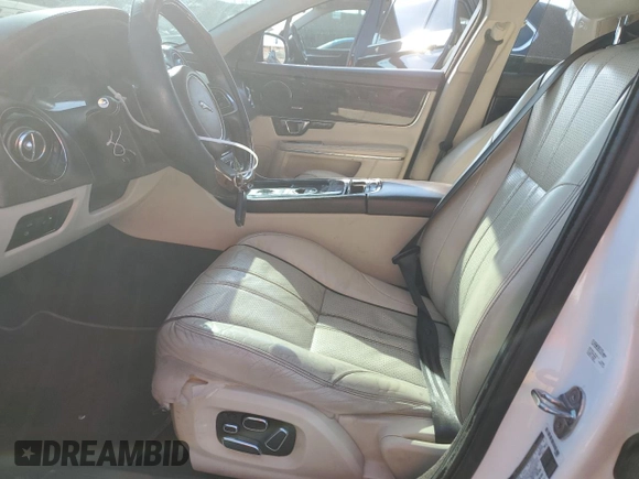 2014 Jaguar XJ with VIN SAJWA2GZ9E8V71794, listed as a Copart auction lot 74347574 with 106,172 mi miles and Clean Title. Bid and sale history available at carsss.com. Image 7.