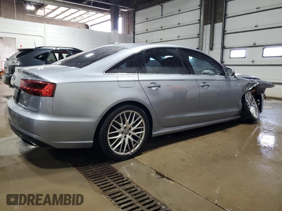 2016 Audi A6 Prestige z VIN WAUHGAFC1GN080778, wystawiony jako Copart lot #60999185 z przebiegiem 62 447 mil mil oraz Szkoda całkowita • Salvage title. Historia ofert i sprzedaży dostępna na DreamBid. Obrazek 3.