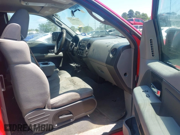 2007 Ford F-150 STX with VIN 1FTRX12W37KD27646, listed as a IAAI auction lot 42259231 with 186,713 mi miles and . Bid and sale history available at DreamBid. Image 5.