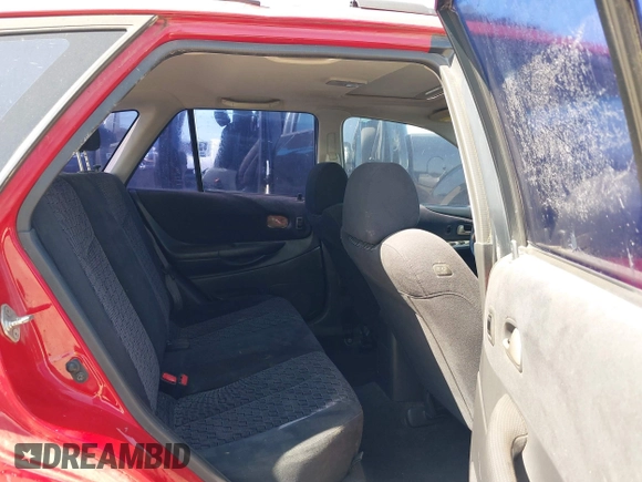 2002 Mazda Protege with VIN JM1BJ246721565634, listed as a IAAI auction lot 41984727 with 235,764 mi miles and . Bid and sale history available at DreamBid. Image 8.