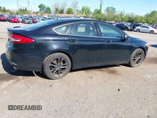2017 Ford Fusion SE with VIN 3FA6P0HD5HR165895, listed as a IAAI auction lot 42130227 with 85,545 mi miles. Bid and sale history available at carsss.com. Image 4.