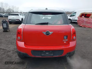 2013 MINI Cooper Countryman with VIN WMWZB3C57DWM07565, listed as a IAAI auction lot 41655938 with 62,694 mi miles. Bid and sale history available at carsss.com. Image 16.