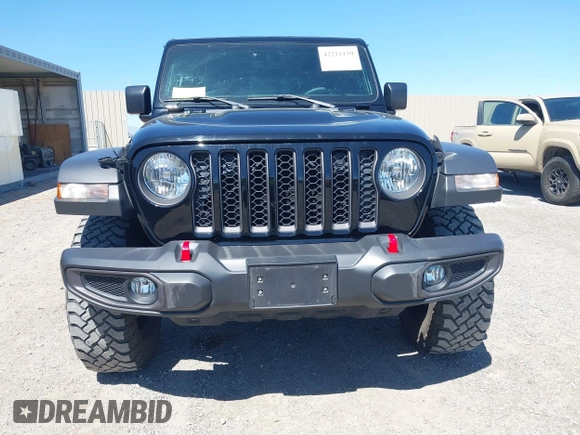 2023 Jeep Gladiator Rubicon z VIN 1C6JJTBG3PL531982, wystawiony jako IAAI lot #42211139 z przebiegiem 28 301 mil mil oraz . Historia ofert i sprzedaży dostępna na DreamBid. Obrazek 6.
