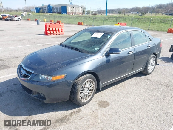 2004 Acura TSX w/Navigation with VIN JH4CL96974C017539, listed as a IAAI auction lot 41918507 with 168,557 mi miles. Bid and sale history available at carsss.com. Image 2.