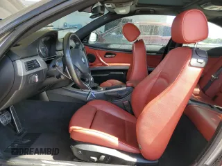 2011 BMW 3 Series 335is with VIN WBAKG1C52BE617713, listed as a Copart auction lot 74064204 with 132,742 mi miles and Salvage Title. Bid and sale history available at carsss.com. Image 7.