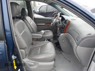 2004 Toyota Sienna XLE with VIN 5TDBA22C74S003781, listed as a IAAI auction lot 41570829 with 217,728 mi miles. Bid and sale history available at carsss.com. Image 5.