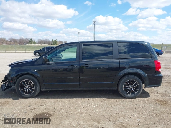 2017 Dodge Grand Caravan SXT with VIN 2C4RDGCG8HR756271, listed as a IAAI auction lot 41877283 with 136,598 mi miles and . Bid and sale history available at DreamBid. Image 14.