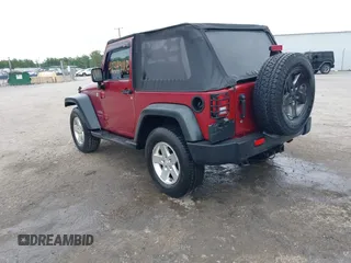 2012 Jeep Wrangler Sport with VIN 1C4AJWAG3CL197295, listed as a IAAI auction lot 42349118 with 117,381 mi miles and . Bid and sale history available at DreamBid. Image 3.
