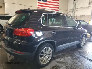 2013 Volkswagen Tiguan SE z VIN WVGBV7AX9DW529234, wystawiony jako Copart lot #41610635 z przebiegiem 130 566 mil mil oraz Szkoda całkowita • Salvage title. Historia ofert i sprzedaży dostępna na DreamBid. Obrazek 3.
