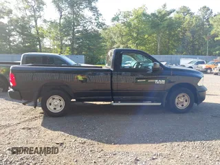 2014 Ram 1500 Tradesman z VIN 3C6JR7DG4EG324833, wystawiony jako IAAI lot #42876061 z przebiegiem 125 285 mil mil oraz . Historia ofert i sprzedaży dostępna na DreamBid. Obrazek 13.