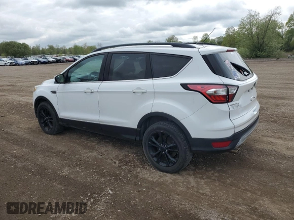 2018 Ford Escape SE z VIN 1FMCU9G97JUB48596, wystawiony jako Copart lot #56388505 z przebiegiem 96 996 mil mil oraz Czysty tytuł • Clean title. Historia ofert i sprzedaży dostępna na DreamBid. Obrazek 2.