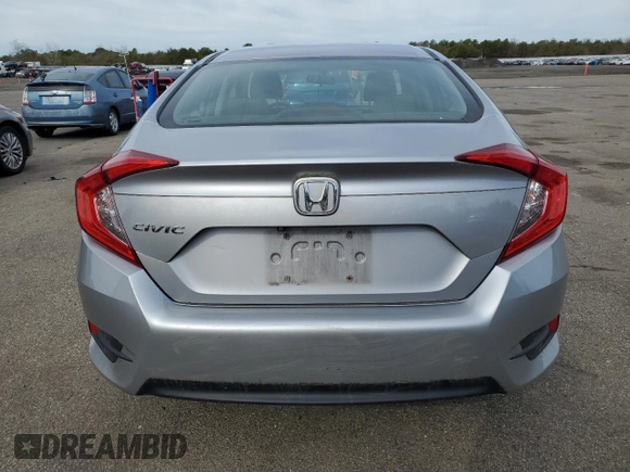 2017 Honda Civic LX z VIN 2HGFC2F52HH551152, wystawiony jako Copart lot #52728275 z przebiegiem 64 376 mil mil oraz Szkoda całkowita • Salvage title. Historia ofert i sprzedaży dostępna na DreamBid. Obrazek 6.
