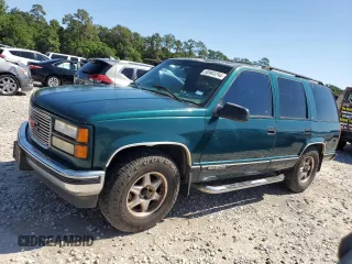 1999 GMC Yukon with VIN 1GKEC13R8XJ792078, listed as a Copart auction lot 50903294 with 232,672 mi miles and Salvage Title. Bid and sale history available at carsss.com. Image 1.