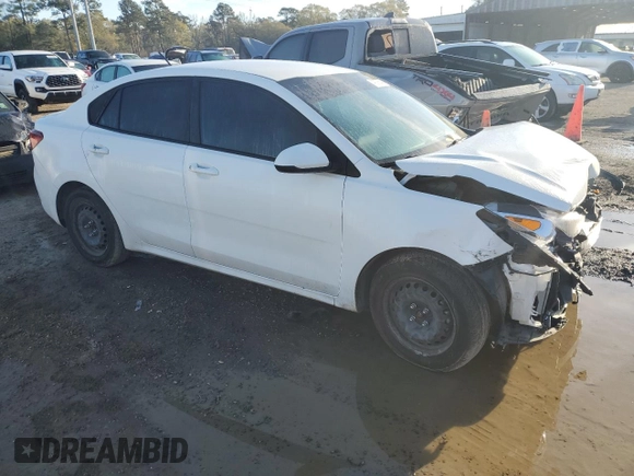 2022 Kia Rio LX with VIN 3KPA24AD3NE479603, listed as a Copart auction lot 49273645 with 67,286 mi miles and Salvage Title. Bid and sale history available at DreamBid. Image 4.