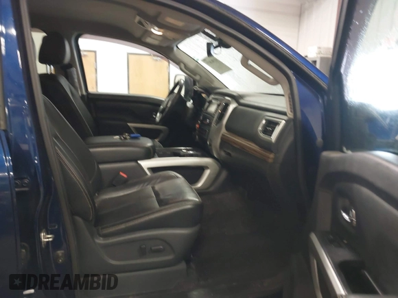 2017 Nissan Titan Pro-4X z VIN 1N6BA1F44HN551551, wystawiony jako IAAI lot #41581877 z przebiegiem 64 834 mil mil oraz . Historia ofert i sprzedaży dostępna na DreamBid. Obrazek 5.