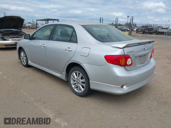 2009 Toyota Corolla with VIN 1NXBU40EX9Z028809, listed as a IAAI auction lot 42111892 with 156,182 mi miles. Bid and sale history available at carsss.com. Image 3.