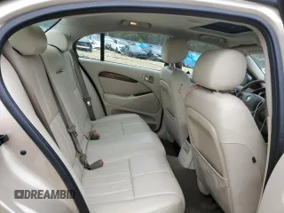 2003 Jaguar S-Type z VIN SAJEA01U33HM71782, wystawiony jako Copart lot #82969304 z przebiegiem 127 176 mil mil oraz Szkody całkowita. Historia ofert i sprzedaży dostępna na DreamBid. Obrazek 11.