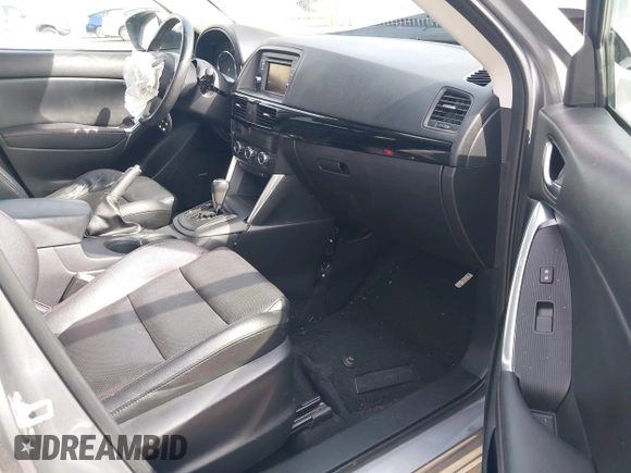 2014 Mazda CX-5 Grand Touring with VIN JM3KE4DY9E0375014, listed as a IAAI auction lot 42000382 with 110,584 mi miles and . Bid and sale history available at DreamBid. Image 5.